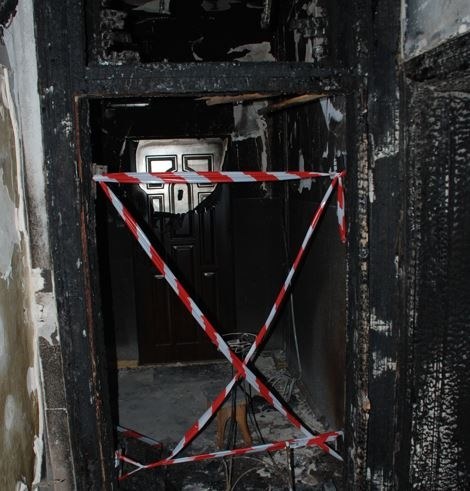 Spalone wejście do mieszkania /KPP Malbork /Policja