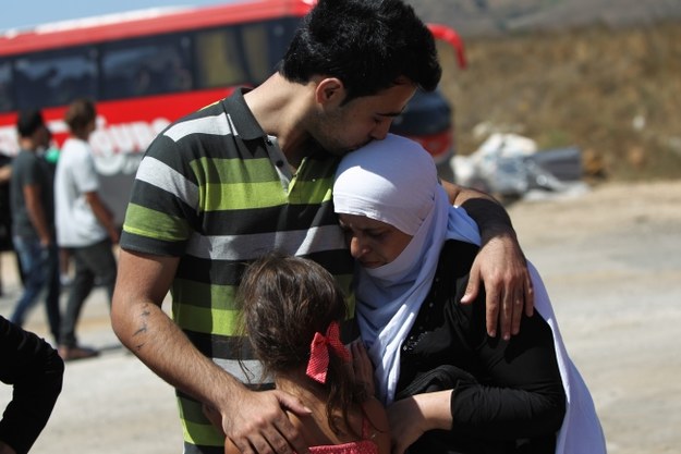 Syryjczycy uciekający z kraju do Izraela /ATEF SAFADI  /PAP/EPA