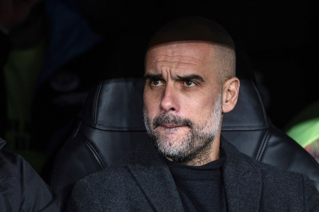 Szkoleniowiec Manchesteru City Pep Guardiola w czasie meczu The Citizens z Realem Madryt w 1/8 finału Ligi Mistrzów (26 lutego 2020) /Rodrigo Jimenez /PAP/EPA