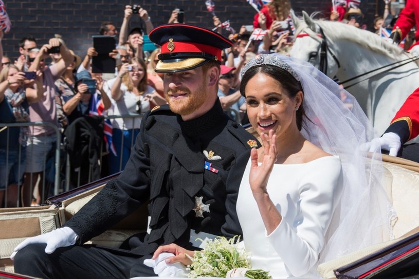 Szósty w linii sukcesji do brytyjskiego tronu książę Harry ożenił z aktorką Meghan Markle /East News