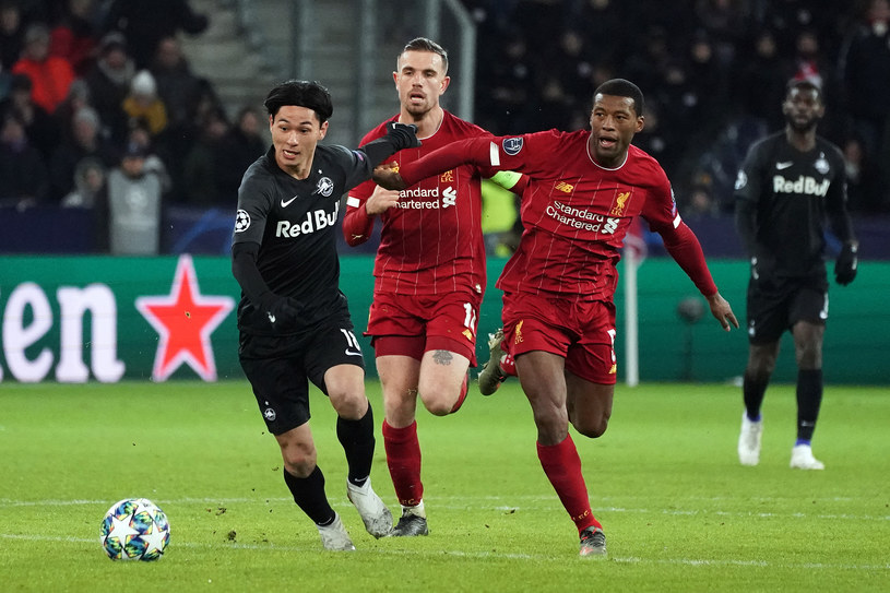 Takumi Minamino i Georginio Wijnaldum podczas meczu RB Salzburg - Liverpool FC /Koji Watanabe /Getty Images