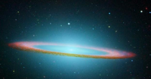 Teleskop Spitzera próbuje rozwikłać zagadkę nadprogramowego światła w kosmosie /NASA