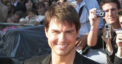 Tom Cruise spóźnił się ze sprzedażą zdjęć swojej córeczki /AFP