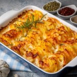 Tu króluje kremowy sos i ciągnący się ser. Przepis na zapiekankę z sosem śmietanowym