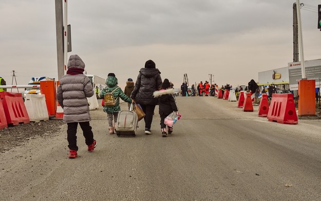 Uchodźcy na granicy /Shutterstock