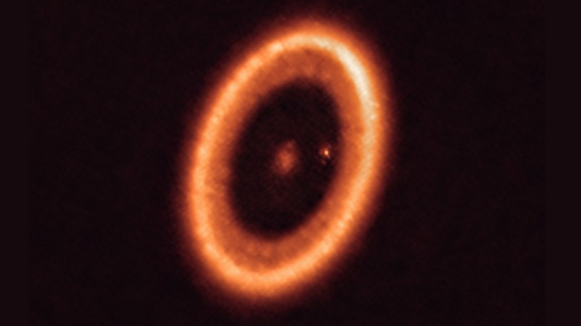 The star system PDS 70 is located about 400 light-years away.  /ALMA (ESO/NAOJ/NRAO)/Bensti et al.  /External materials
