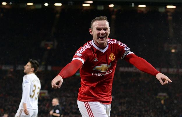 Umocnienie się funta wobec euro pomogło angielskim klubom (nz. W. Rooney z MU) /AFP