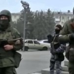 Uzbrojeni ludzie na ulicach Ługańska. Konflikt między separatystami