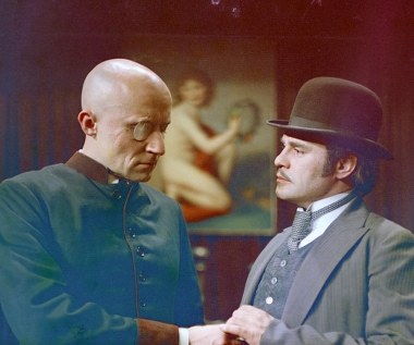 W 1975 roku Roman Wilhelmi zagrał w filmie Waleriana Borowczyka "Dzieje grzechu", będącym ekranizacją skandalizującej powieści Stefana Żeromskiego. "Postać Pochronia tam zagrana niesłychanie mnie bawiła" - wspominał po latach w rozmowie z Ewą Moskalówną dla "Głosu Wybrzeża".