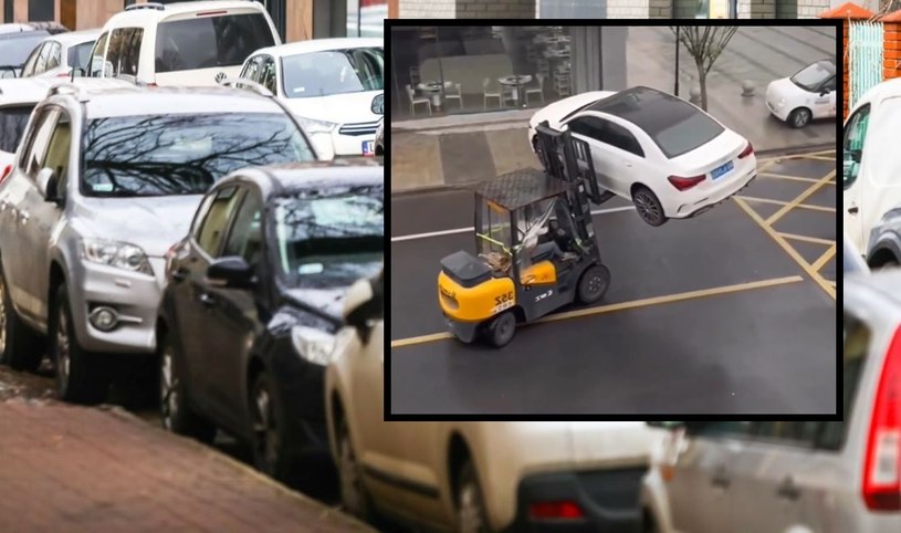 W mediach społecznościowych zostało udostępnione nagranie, na którym widać, jak wózek widłowy podnosi nieprawidłowo zaparkowany samochód i przewozi go na lawetę. /supercar.fails/ Instagram/ zrzut ekranu /