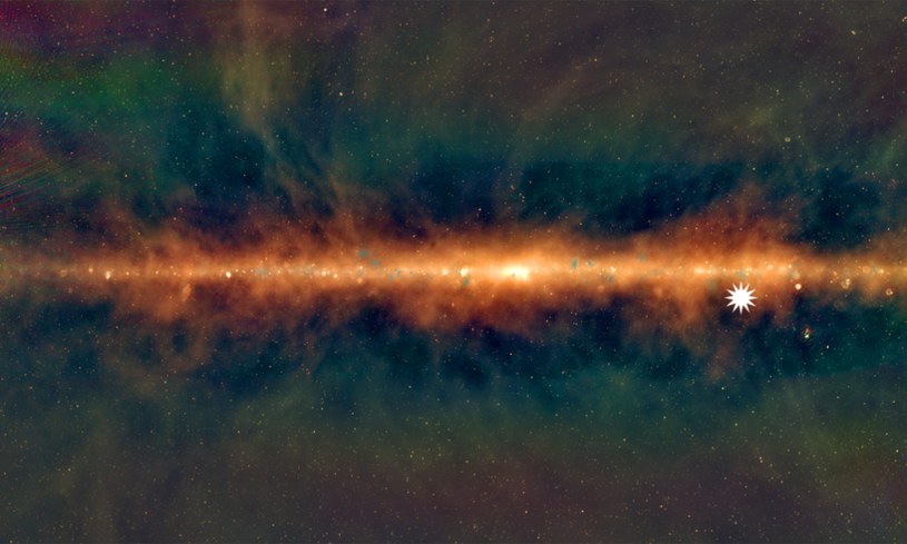 Widok z teleskopu Murchison Widefield Array - najniższe częstotliwości czerwone, średnie zielone, a najwyższe niebieskie. Gwiazdka pokazuje pozycję tajemniczego sygnału /ICRAR /materiały prasowe