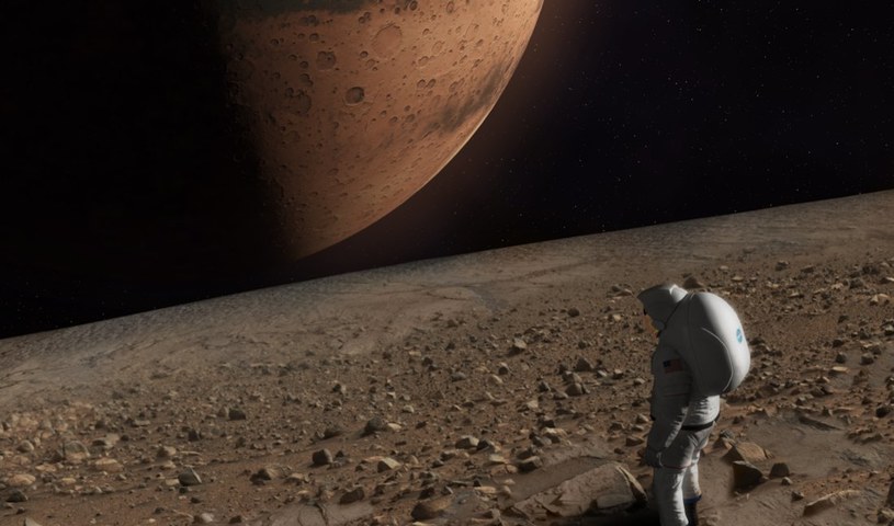 Wizja lat 30. XXI wieku? Astronauta spogląda na Marsa z powierzchni Fobosa /NASA