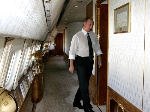Władimir Putin na pokładzie samolotu /ITAR-TASSS /PAP
