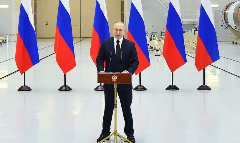 Władimir Putin podczas niedawnego wystąpienia przed systemami rakietowymi /Sputnik/AFP /Getty Images