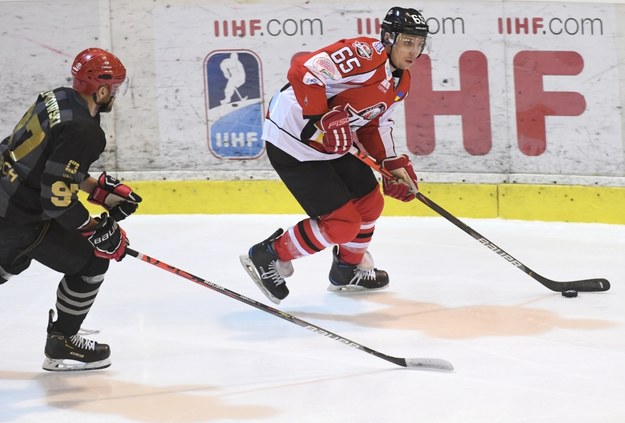 Zawodnik Cracovii Comarch Mateusz Rompkowski  i Alexander Vasilev /	Jacek Bednarczyk   /PAP