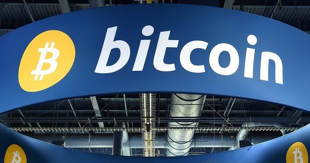 Zdaniem analityków Saxo Banku, w 2018 r. bitcoin osiągnie szczyt na poziomie powyżej 60 tys. dolarów /AFP