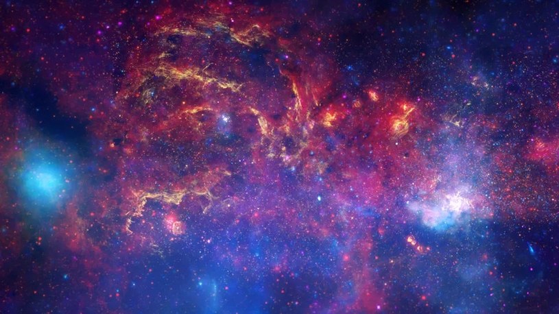 Zdjęcie centrum Drogi Mlecznej, które jest rekonstrukcją obrazów z różnych teleskopów /NASA, ESA, SSC, CXC and STScI /materiał zewnętrzny