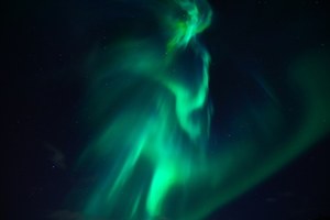 Northern lights over the Baltic Sea.  The midnight lights danced as if in a play!