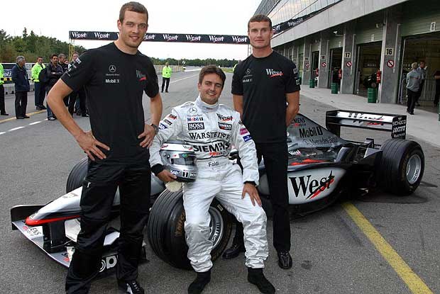 Zwycięzca wraz z Davidem Coulthardem i Alexem Wurzem (kliknij) /INTERIA.PL